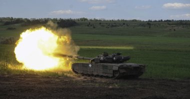 A Ukrainian tank fires in Chasiv Yar, Ukraine, June 7, 2023. (AP Photo)