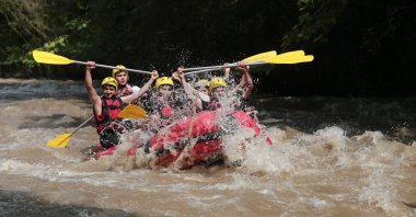 Tourists raft in Orhaneli, in Bursa, Türkiye, June 12, 2023. (IHA Photo)