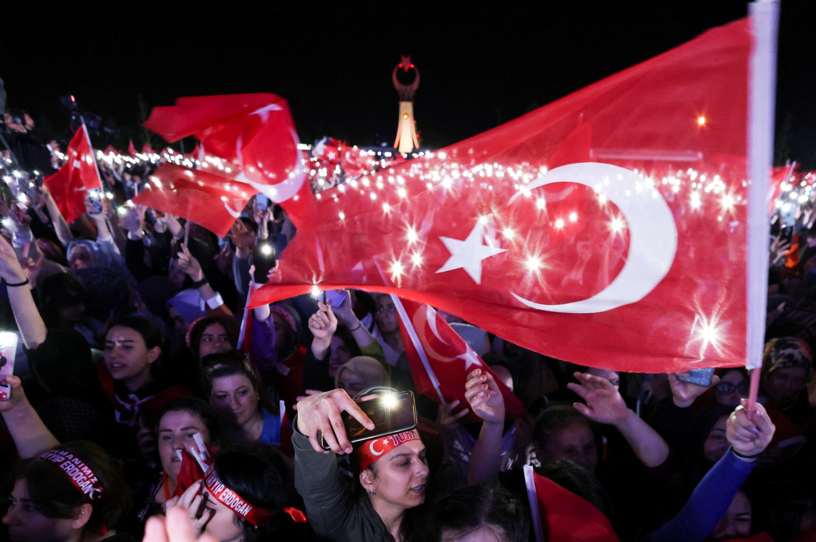Supporters of President Recep Tayyip Erdoğan celebrate following his victory in the second round of the presidential election in Ankara, Türkiye, May 28, 2023. (Reuters Photo)