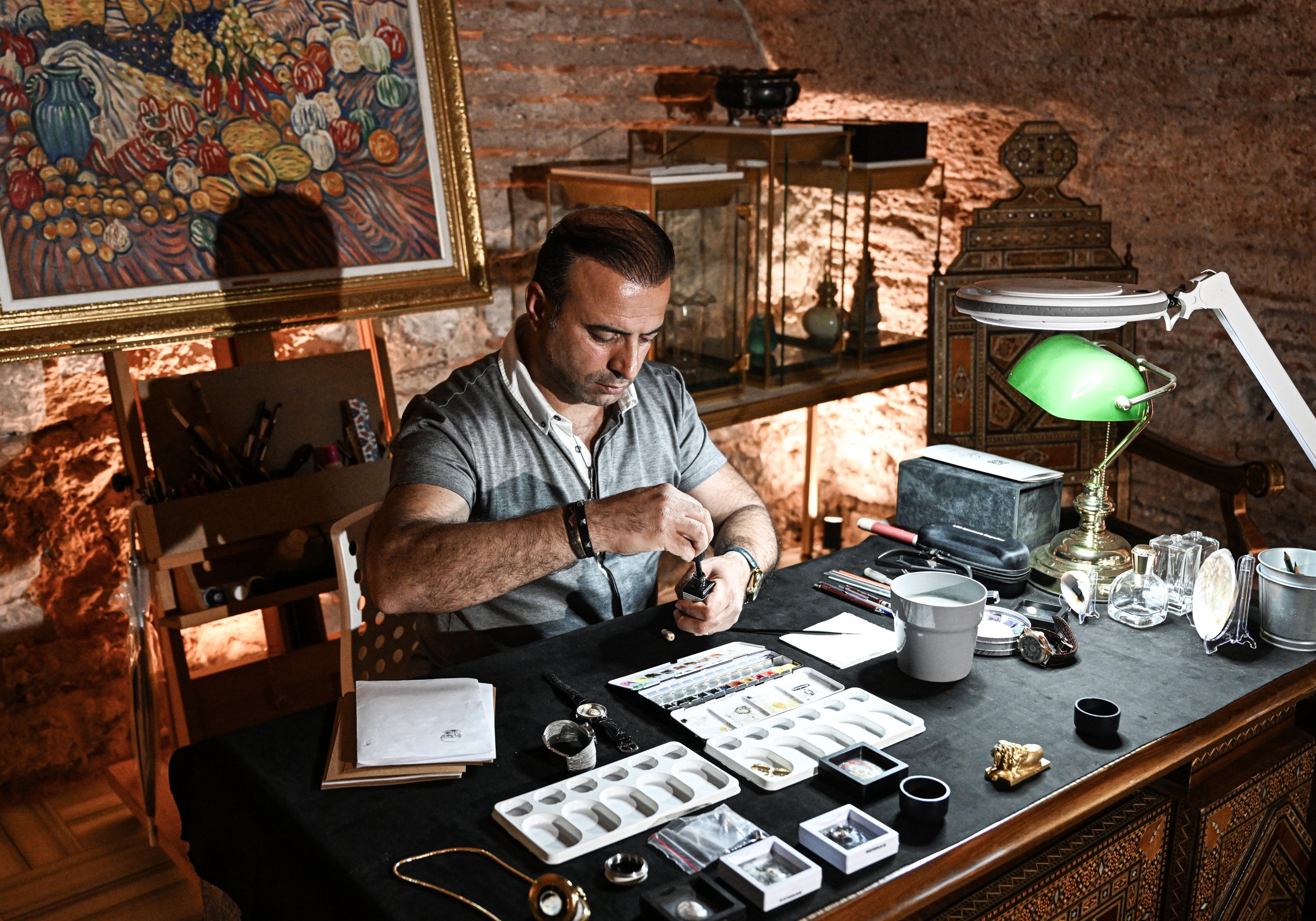 Murat Uçar, who specializes in micro art techniques, designed a clock depicting Leonardo da Vinci's "The Last Supper" for Pope Francis, the bishop of Rome and sovereign of the Vatican City State, Istanbul, Türkiye, June 6, 2023. (AA Photo)