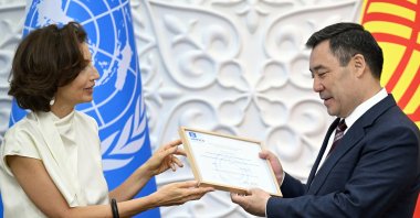 UNESCO Director-General Audrey Azoulay (L) presents a certificate that recognizes the Kyrgyz epic Manas as a shared heritage of humanity to Kyrgyz President Sadyr Zhaparov, Kyrgyzstan, June 8, 2023. (AA Photo)