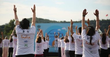 People are seen during a yoga session in Istanbul, Türkiye, June 21, 2022. (Courtesy of the Indian Embassy)