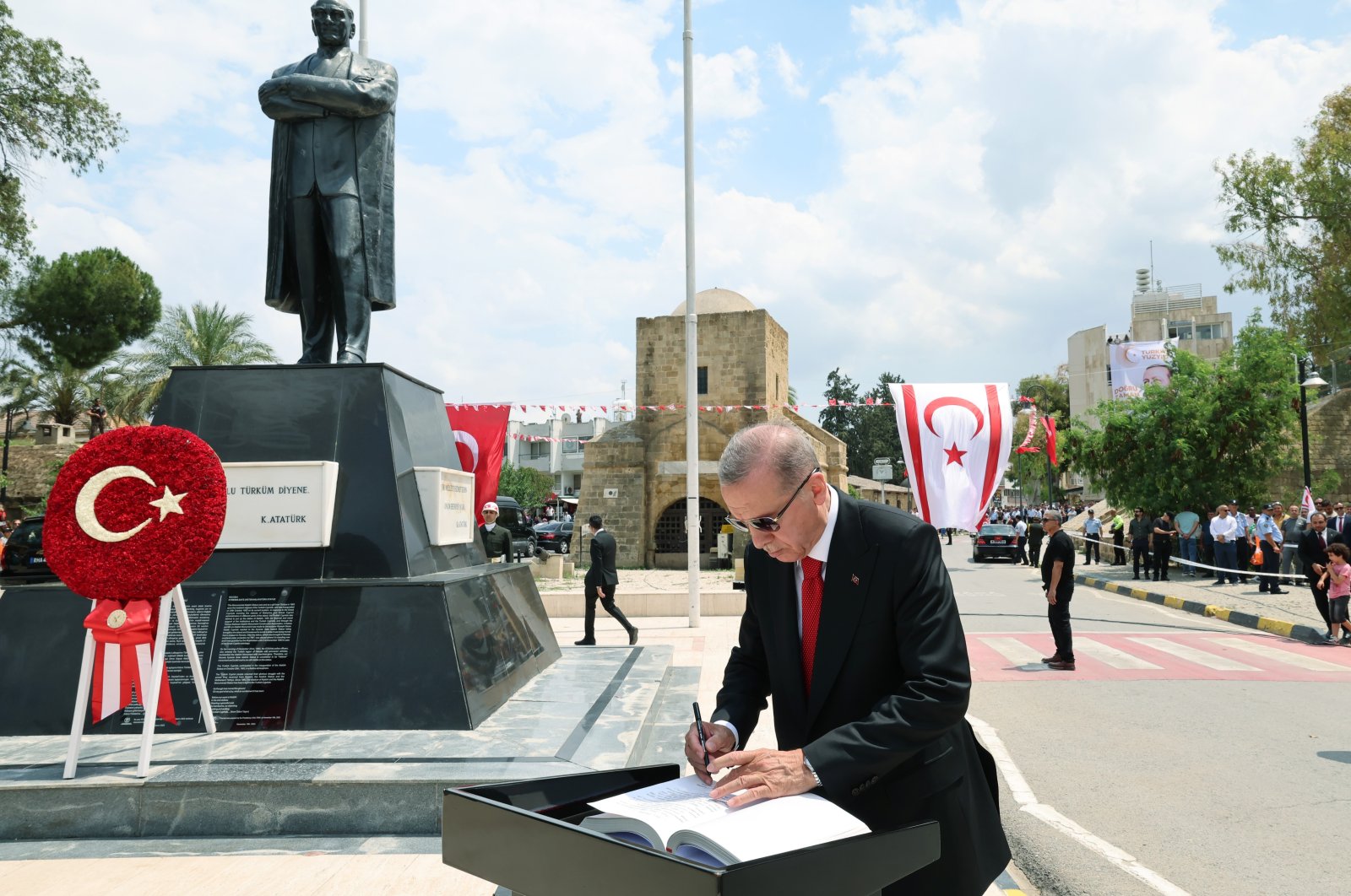President Recep Tayyip Erdoğan laid a wreath at the Atatürk Monument in Lefkoşa as part of his visit to the Turkish Republic of Northern Cyprus (TRNC), June 12, 2023. (IHA Photo)