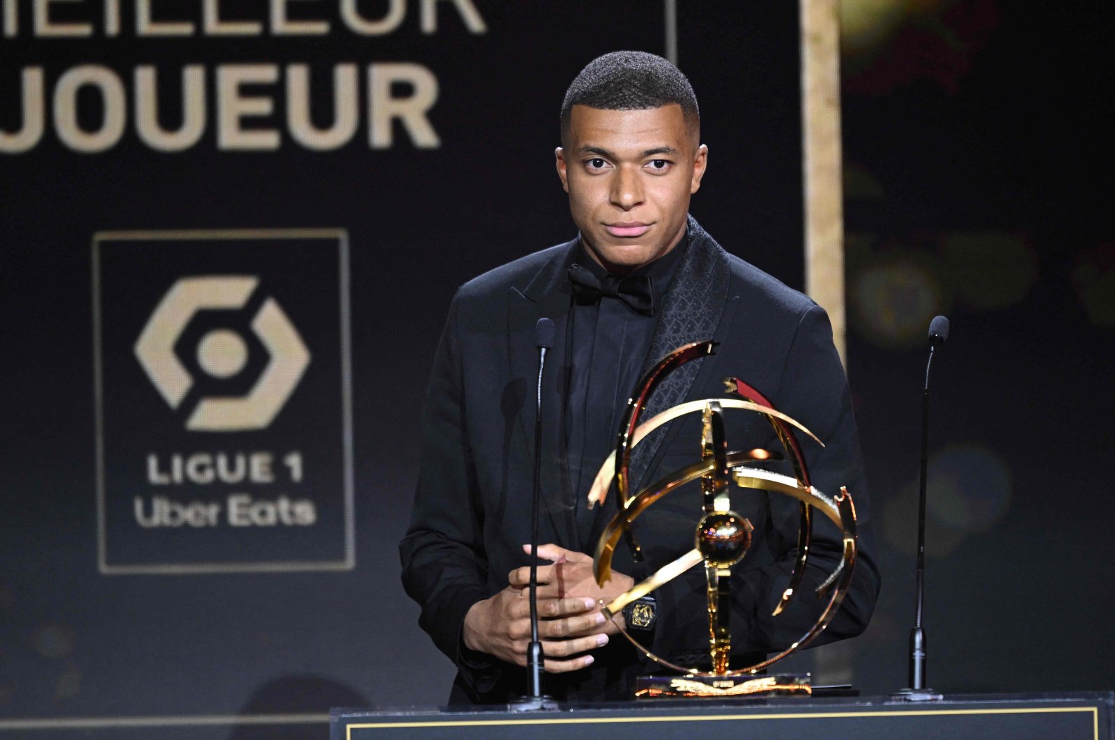 Paris Saint-Germain&#039;s French forward Kylian Mbappe delivers a speech after receiving the Best Ligue 1 Player award during the 31st edition of the French National Professional Football Players Union (UNFP) trophy ceremony, Paris, France, May 28, 2023. (AFP Photo)