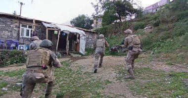 Turkish soldiers storm a house in an operation against PKK in Şırnak, southeastern Türkiye, June 12, 2023. (AA Photo) 