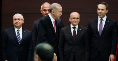 President Recep Tayyip Erdoğan walks next to the new Treasury and Finance Minister Mehmet Şimşek during a press conference where the new Cabinet was announced, Ankara, Türkiye, June 3, 2023. (Reuters Photo)
