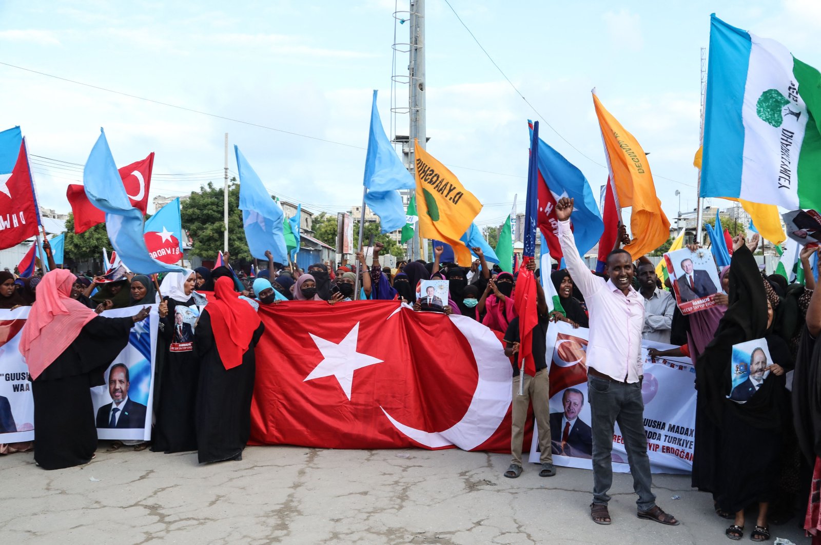 Somalis celebrate the victory of President Recep Tayyip Erdoğan after he won the presidential run-off election during the celebration organized by the government in Mogadishu, Somalia, May 29, 2023. (AFP Photo)
