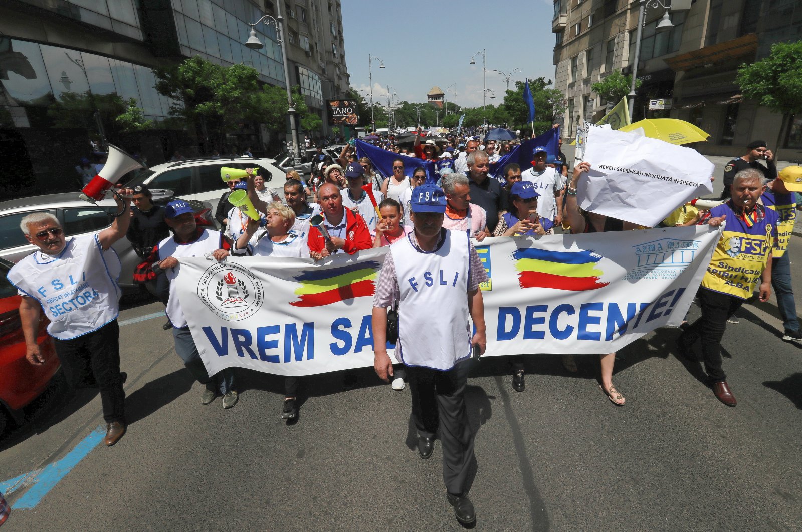 Romanian teachers carry banners and shout anti-government slogans during a trade union protest march in downtown Bucharest, Romania, May 25, 2023. (EPA Photo)