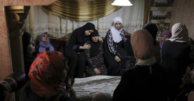 Relatives mourn during the funeral of Khalil Al Anees, at Al-Ain refugee camp, near the occupied West Bank city of Nablus, Palestine, June 15, 2023. (EPA Photo)