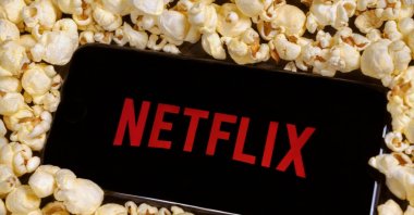 Netflix logo on a smartphone. (Shutterstock Photo)