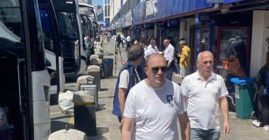 Crowds of citizens are photographed at the bus terminal prior to the Eid holiday, Istanbul, Türkiye, June 14, 2023. (IHA Photo)