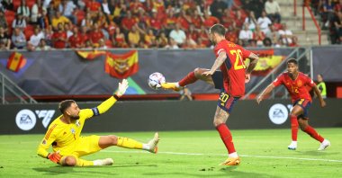 Spain's Joselu (C) scores their second goal past Italy's Gianluigi Donnarumma during the UEFA Nations League semifinal match at the De Grolsch Veste, Enschede, Netherlands, June 15, 2023. (Reuters Photo) 