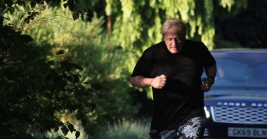 Former British Prime Minister Boris Johnson runs near his home in Brightwell-cum-Sotwell, Oxfordshire, Britain, June 15, 2023. (Reuters Photo)