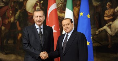 Then-Prime Minister Recep Tayyip Erdoğan shakes hands with Italian Prime Minister Silvio Berlusconi (R) during their meeting at Chigi Palace in Rome, Italy, Nov. 17, 2009. (EPA File Photo)