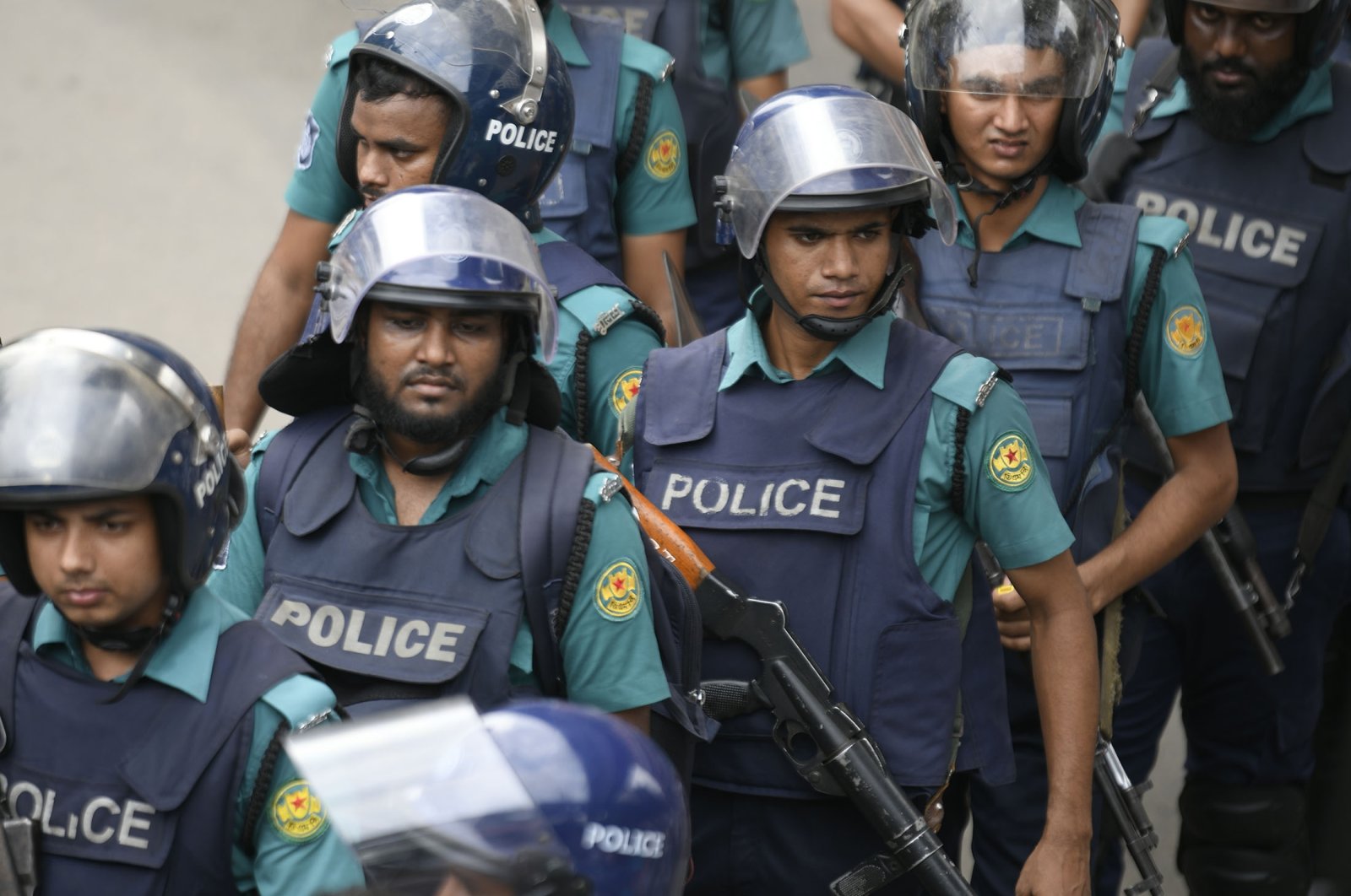 Bangladeshi police members stand guard in front of the Baitul Mukarram mosque during Friday prayer in Dhaka, Bangladesh, June 16, 2023. (Reuters Photo)