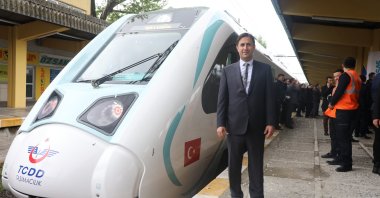 Ufuk Yalçın, general manager of Turkish State Railways (TCDD), poses next to the train, Ankara, Türkiye, June 16, 2023. (AA Photo)