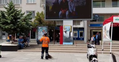 Hazret Özkanlı watches the video his sons prepared for Father's Day, Aksaray, central Türkiye, June 18, 2023. (IHA Photo)