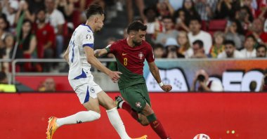 Portugal's Bruno Fernandes (L) vies with Bosnia's Amar Dedic during a UEFA Euro 2024 qualifiers in Lisbon, Portugal, June 17, 2023. (AFP Photo)