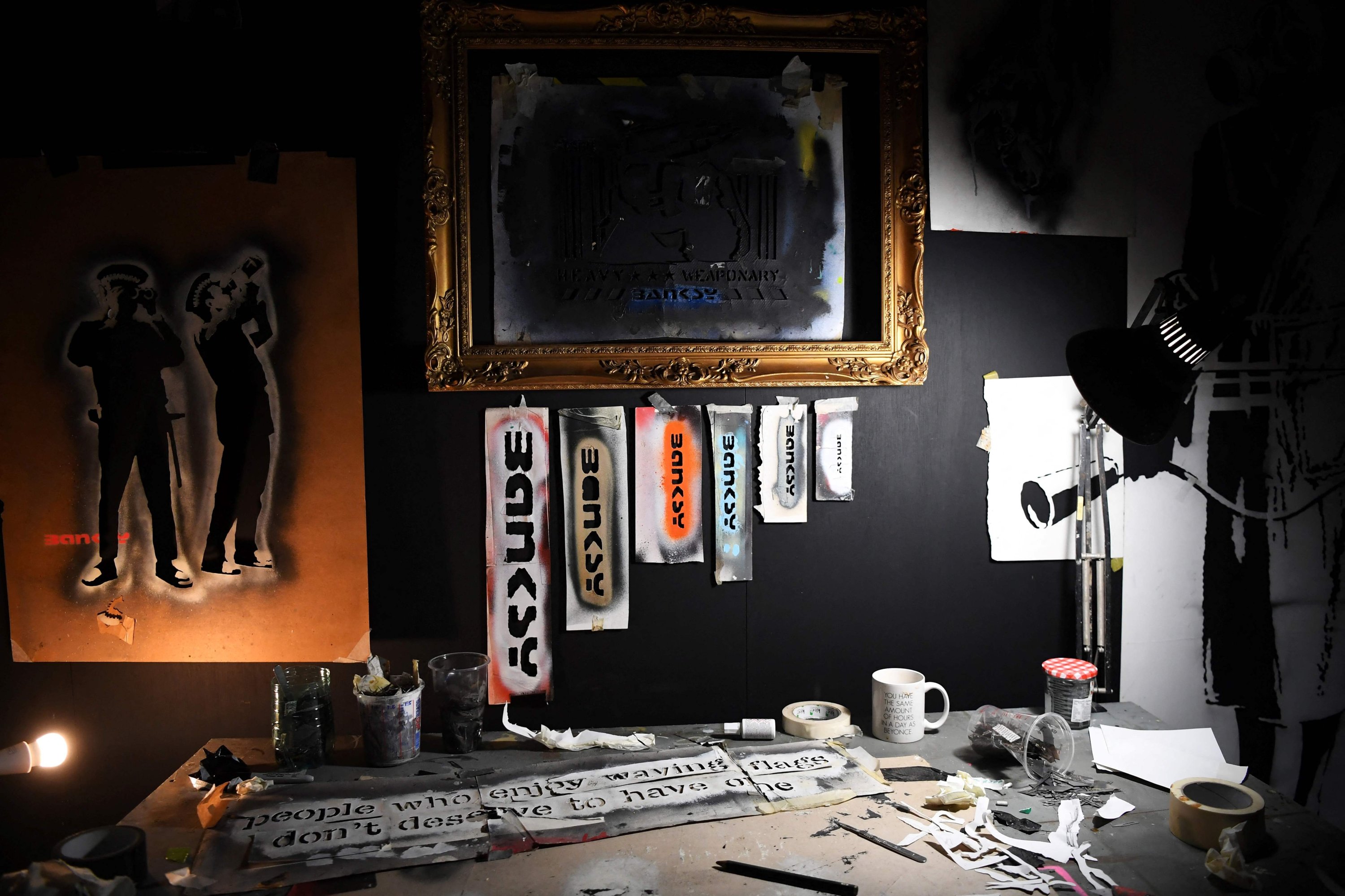 The photograph shows a general view of some of the art pieces displayed during the British artist Banksy solo show 