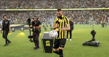 Former Real Madrid striker Karim Benzema plays with a ball at Al-Ittihad's stadium, Jeddah, Saudi Arabia, June 8, 2023. (AFP Photo)