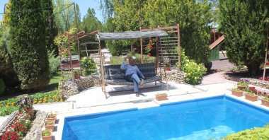 A resident creates an oasis in the drought-prone Karapınar district of Konya, Türkiye, June 19, 2023. (IHA Photo)