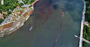 An aerial view of the Golden Horn's brown hue caused by inadequate wastewater treatment, Istanbul, Türkiye, June 19, 2023. (IHA Photo)