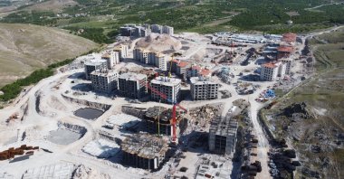 Construction of &quot;earthquake housing,&quot; whose foundations were laid following the devastating Feb. 6 quakes, is progressing rapidly, Malatya, Türkiye, May 25, 2023. (IHA Photo)