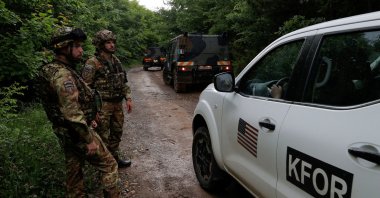 Italian NATO Kosovo Force (KFOR) peacekeepers guard the site near the village of Bare, Kosovo, June 14, 2023. (Reuters Photo)