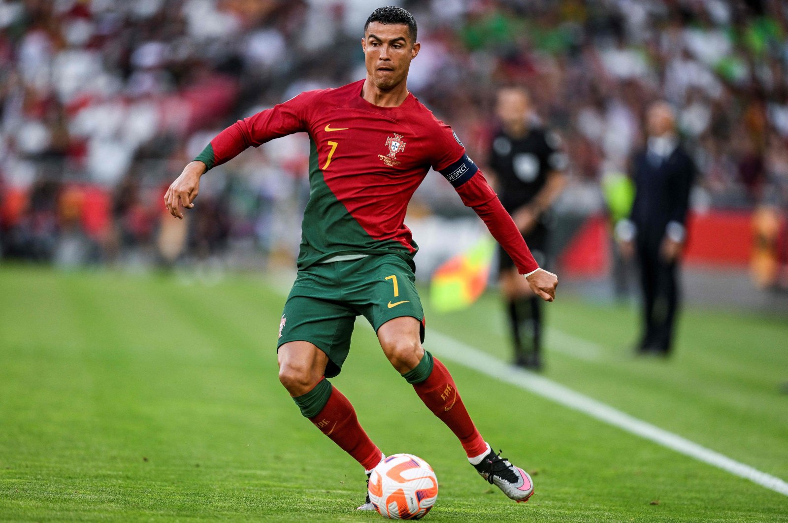 Portugal&#039;s forward Cristiano Ronaldo runs with the ball during the UEFA Euro 2024 group J qualification football match between Portugal and Bosnia-Herzegovina at the Luz stadium, Lisbon, Portugal, June 17, 2023. (AFP Photo)