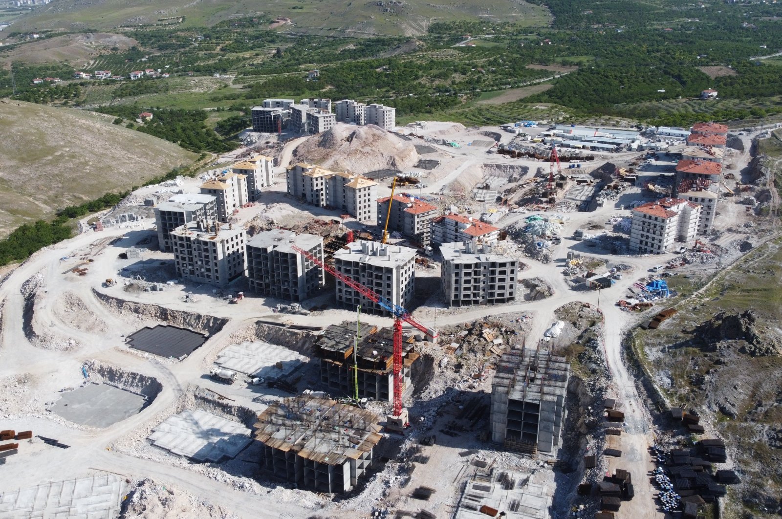 Construction of &quot;earthquake housing,&quot; whose foundations were laid following the devastating Feb. 6 quakes, is progressing rapidly, Malatya, Türkiye, May 25, 2023. (IHA Photo)