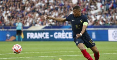 France's Kylian Mbappe (R) in action with Greece's Manolis Siopis during UEFA Euro 2024 Qualifier, Group B match at the Stade de France, Saint-Denis, France, June 19, 2023. (Reuters Photo)