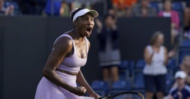 Venus Williams of the U.S. celebrates defeating Italy's Camila Giorgi on day one of the Birmingham Classic tournament at Edgbaston Priory Club, Birmingham, U.K., June 19, 2023. (AP Photo)