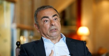 Fugitive former car executive Carlos Ghosn, gestures as he talks during an interview with Reuters in Beirut, Lebanon June 14, 2021. (Reuters File Photo)