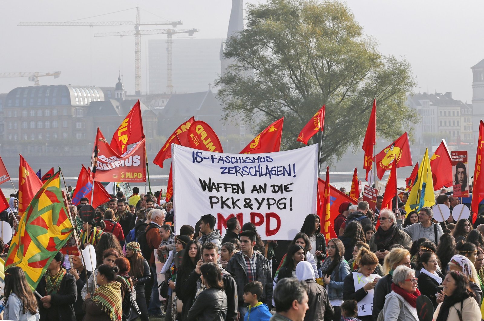 Terrorist YPG/PKK supporters demonstrate in Duesseldorf, Germany, Saturday, Oct. 11, 2014. (AP File Photo)