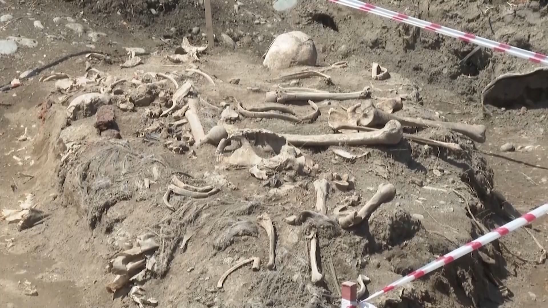 The mass grave discovered in the Sarıcalı village in Aghdam, Karabakh, in this photo released on Wednesday, June 21, 2023. (DHA Photo)