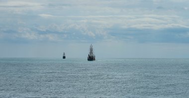 Sailboats are passing near the coast of Side in the Mediterranean Sea in this undated photo, Antalya, Türkiye. (Shutterstock Photo)