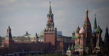 A view of the Kremlin with Spasskaya Tower (C) and St. Basil's Cathedral (R) in downtown Moscow, Russia, April 1, 2023. (AFP Photo)
