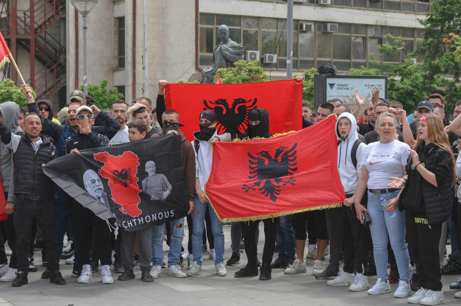 Kosovo Albanians hold Albanian flags take part in a demonstration in the south of Mitrovica, Kosovo, June 1, 2023. (AFP Photo)