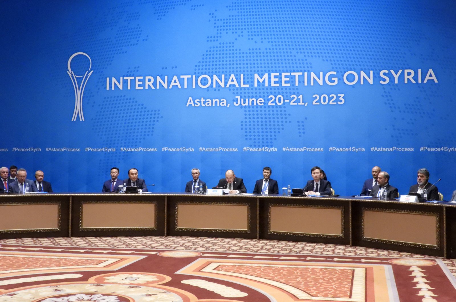 Delegations from Türkiye, Russia, Iran and Syria discuss the peace process in Syria at the 20th round of Astana talks in Astana, Kazakhstan, June 21, 2023. (AA Photo)