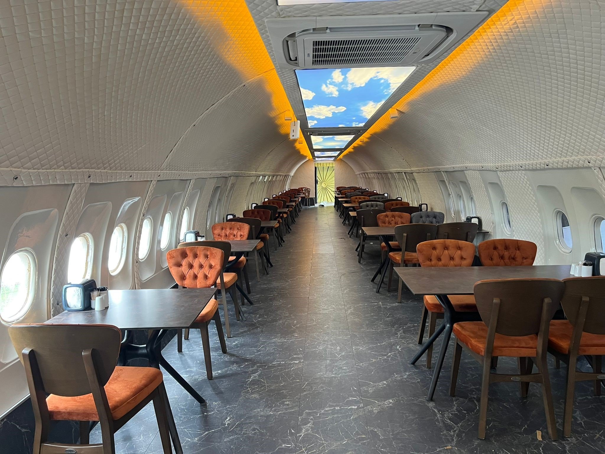 An indoor view of the pide lounge inside the converted aircraft, Trabzon, northern Türkiye, June 22, 2023. (DHA Photo)