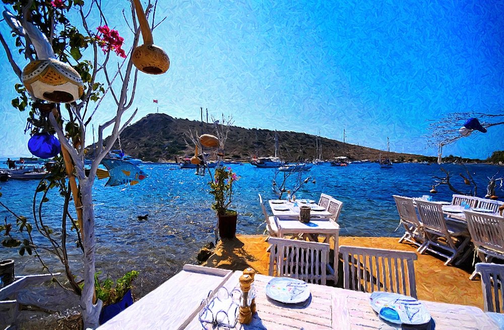 Lukisan minyak restoran tepi pantai yang indah dari kota wisata Bodrum, Muğla, Türkiye yang indah.  (Foto Shutterstock)