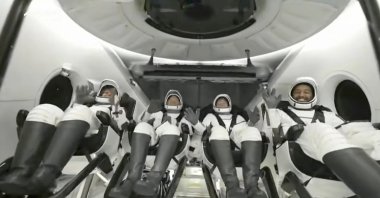 In this image taken from video broadcast by SpaceX, crew members wave after the SpaceX Dragon capsule splashed down into the Gulf of Mexico, just off the Florida Panhandle, May 30, 2023. (AP Photo)