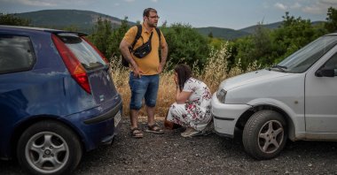 Relatives of wait to meet their relative who survived the shipwreck off the Greek coast wait near a migrant camp in Malakasa, near Athens, Greece, June 16, 2023. (AFP Photo)