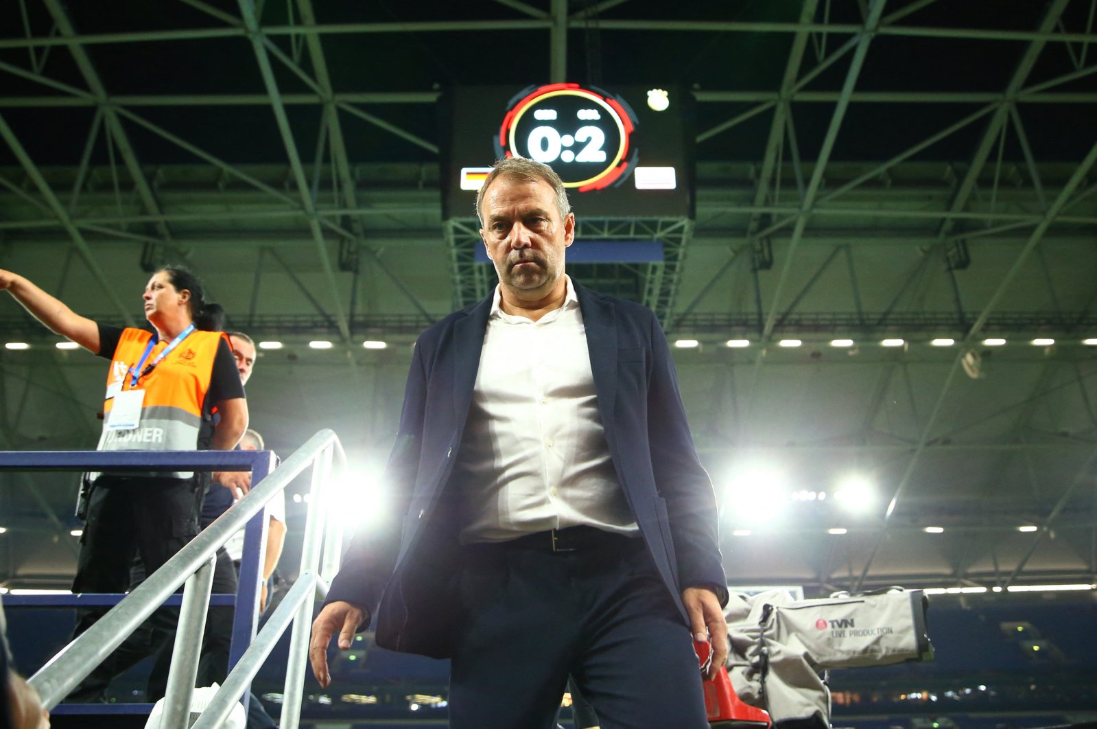 Germany coach Hansi Flick looks dejected after the match against Colombia, Veltins-Arena, Gelsenkirchen, Germany, June 20, 2023. (Reuters Photo)