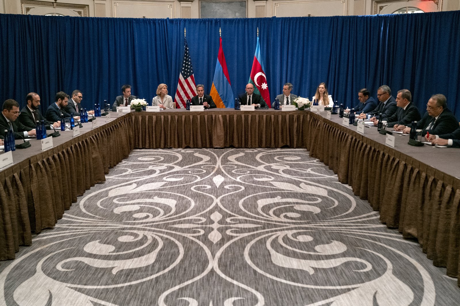 Secretary of State Antony Blinken, center, meets with an Armenian delegation including Foreign Minister Ararat Mirzoyan, third from left, and a delegation with Azerbaijan including Azerbaijani Foreign Minister Jeyhun Bayramov, third from right, in New York, Monday, Sept. 19, 2022. (AP File Photo)