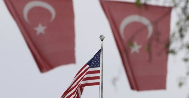 Turkish flags decorate a street outside the United States Embassy in Ankara, Türkiye, April 25, 2021. (AP Photo)