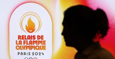 A general view of branding at the ceremony that reads 'Relais de la Flamme Olympique' as Paris 2024 organizers to reveal torch route from Marseille to Paris at the Sorbonne University, Paris, France, June 23, 2023. (Reuters Photo)