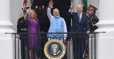 (From L to R) U.S. first lady Jill Biden, India&#039;s Prime Minister Narendra Modi and President Joe Biden wave from the Truman Balcony at the White House, Washington, D.C., U.S., June 22, 2023. (AFP Photo)