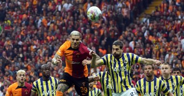 Galatasaray's Mauro Icardi (L) vies for the ball with Fenerbahçe's Luan Peres during the Süper Lig match at the Nef Stadium, Istanbul, Türkiye, June 4, 2023. (AA Photo)