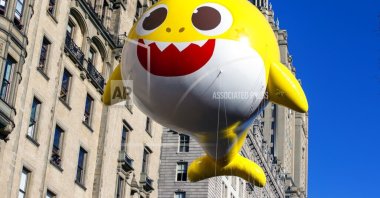 The Baby Shark balloon is on Central Park West in New York City during Macy&#039;s Thanksgiving Day Parade on Thursday, November 24, 2022. (AP Photo)